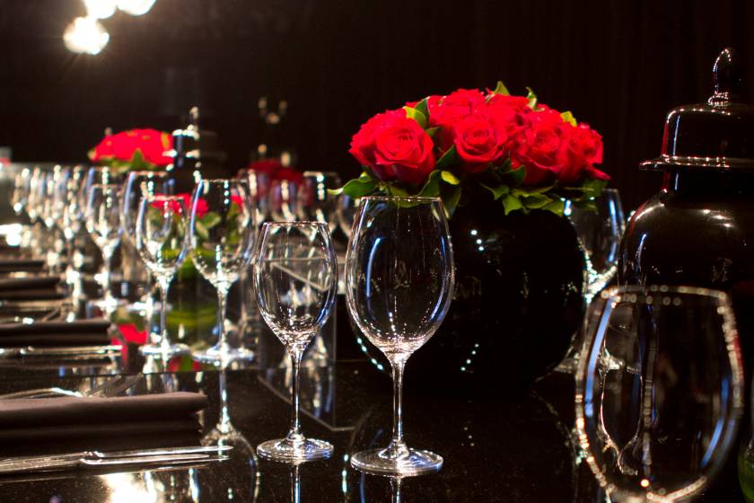 Gala dinner table setting with flowers