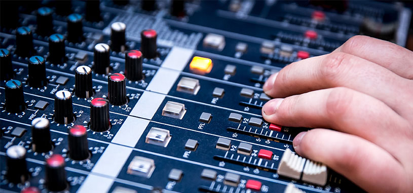 dj participates in event staging set up